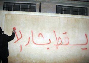 Nieder mit Bashar-Grafitti im März 2011.