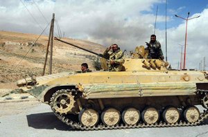 Schleichende Übernahme: Dieser BMP-2 Schützenpanzer, der vormals bei den Republikanischen Garden diente, wurde von der Hisbollah/Libanon übernommen und während der Kampfhandlungen im Raum Aleppo aufgenommen. (Foto: via R. S.)