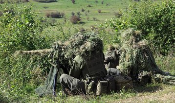 Austrian snipers observe the area. (Photo: EUFOR)